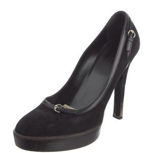 Gucci black suede platform pumps.